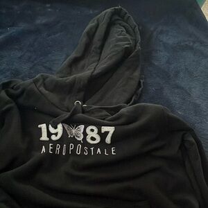 It’s a black white and purple sweatshirt and it’s only been worn 2 time